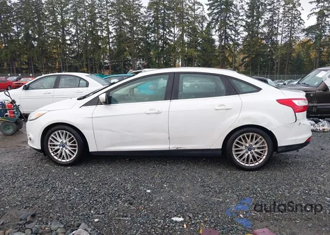 2012 Ford Focus Sel z USA, uszkodzony, nr VIN 1FAHP3H23CL285405